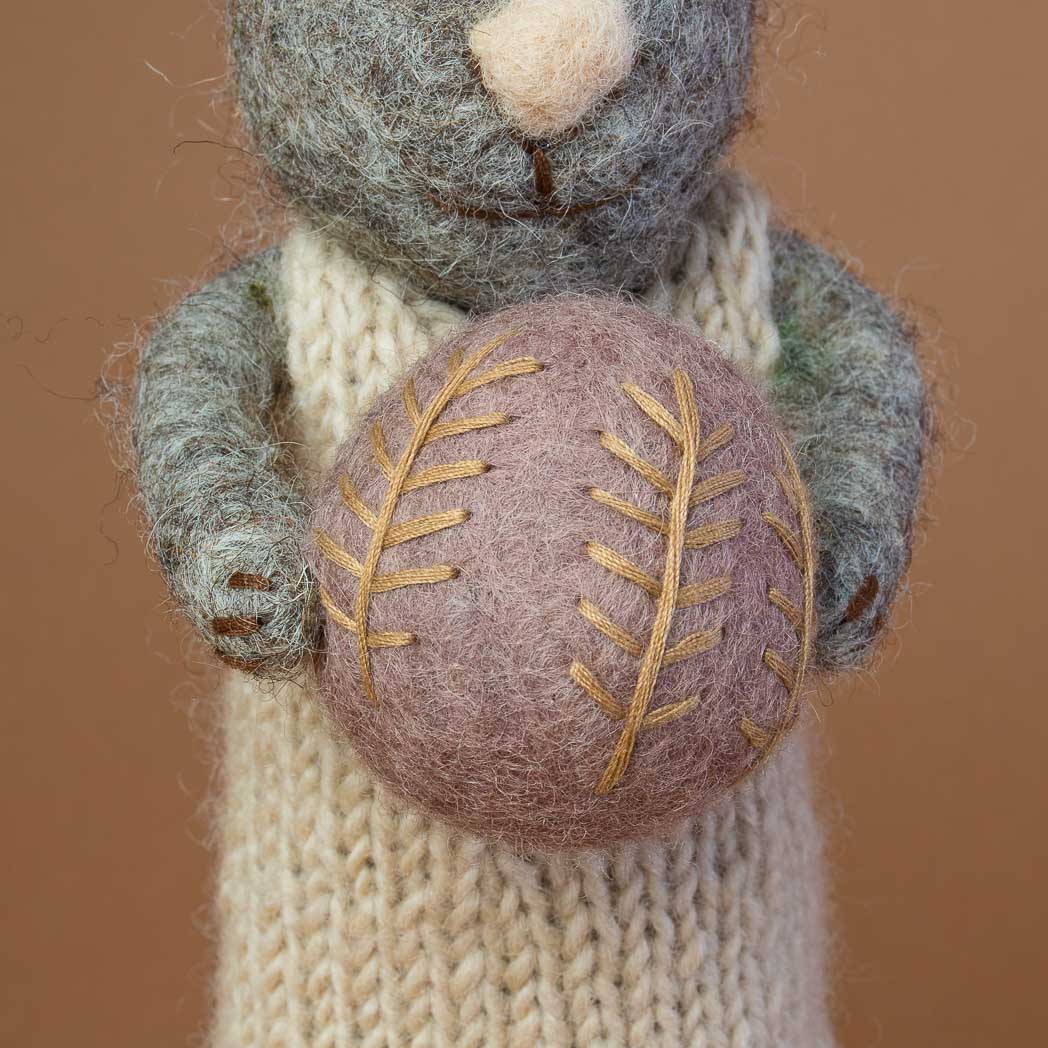 detail-of-embroidered-lavender-colored-easter-egg