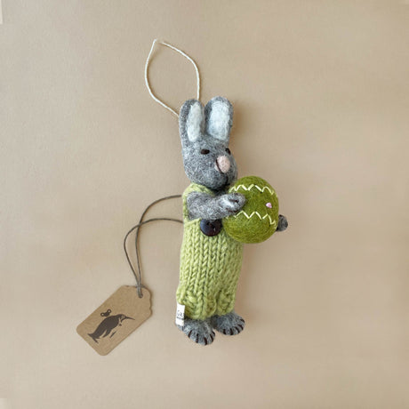felted-grey-rabbit-ornament-wearing-green-overalls-holding-green-easter-egg