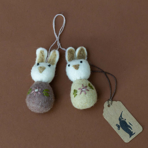  Analyzing image    felted-pom-pom-bunny-ornament-set--white-mauve-with-flower-embroidery