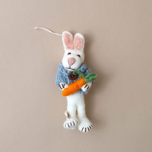 felted-white-rabbit-ornamnet-wearing-knit-blue-sweater-holding-a-carrot