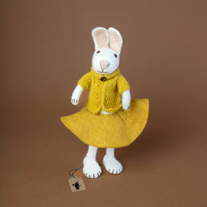white-felted-bunny-girl-wearing-a-yellow-knitted-skirt-and-jacket