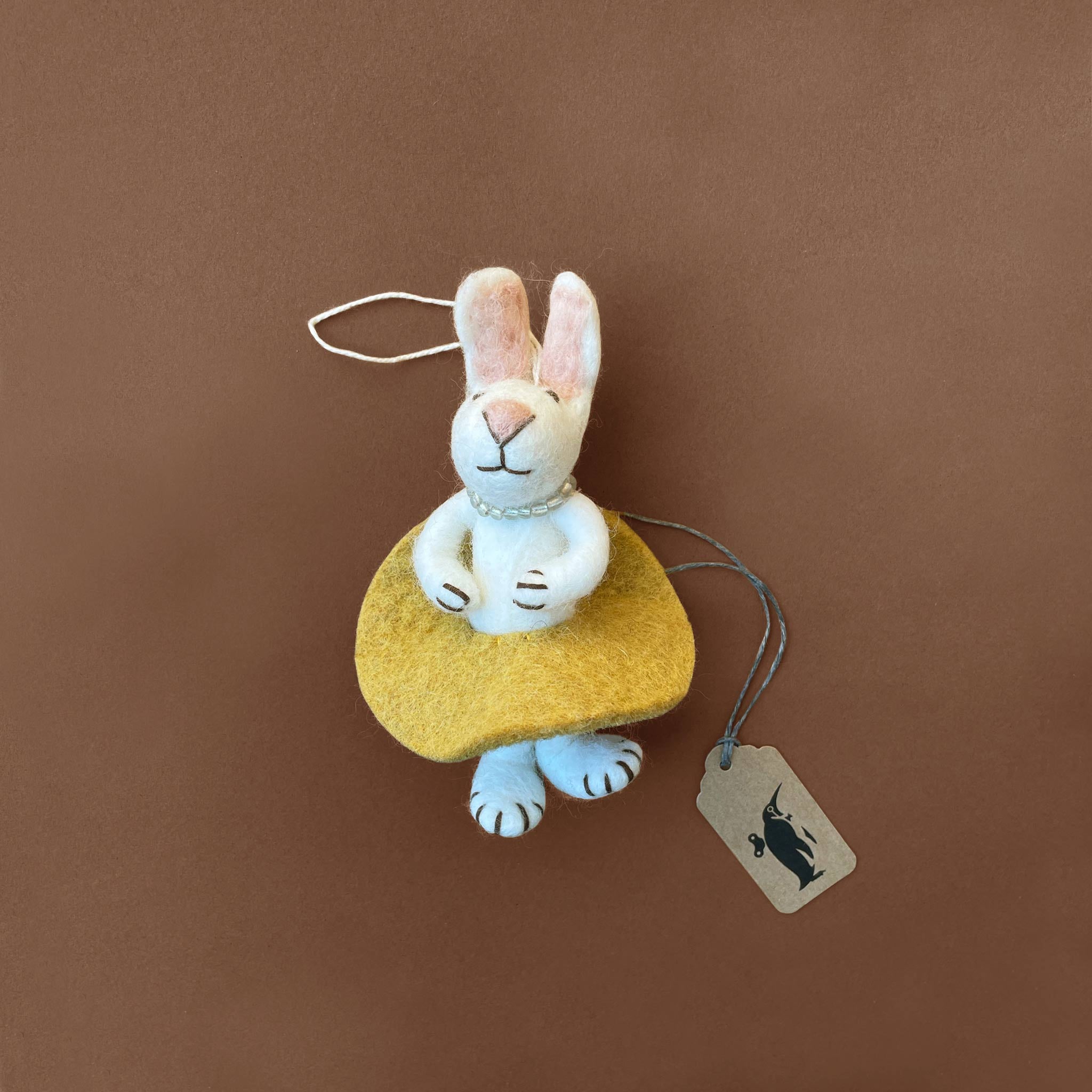 felted-white-rabbit-ornament-wearing-ochre-skirt