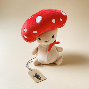 fun-guy-robbie-mushroom-stuffed-animal-with-tilted-red-spotted-cap-and-red-bow
