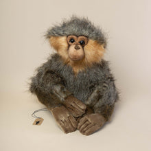 Load image into Gallery viewer, realistic-looking-gibbon-stuffed-animal-in-sitting-position