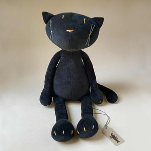 black-cat-plush-with-small-eyes-and-embroidered-details