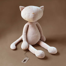 Load image into Gallery viewer, pale-pink-cat-plush-with-stitched-details-sitting-upright