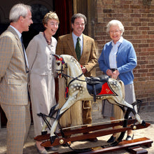 Load image into Gallery viewer, british-royal-family-next-to-rocking-horse