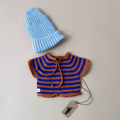 dark-blue-and-orange-striped-romper-with-light-blue-hat