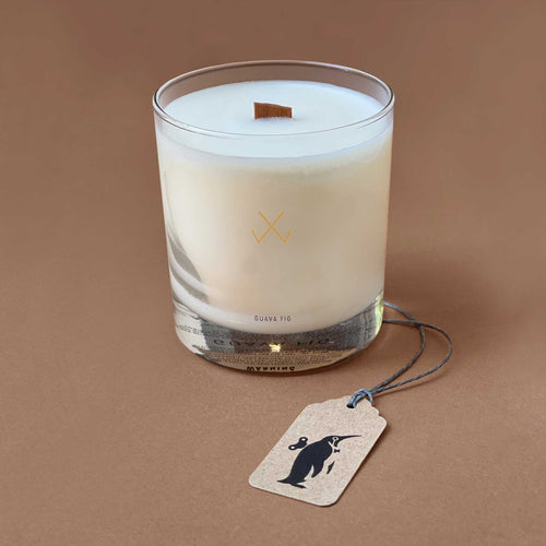 white-wax-candle-with-wooden-wick-in-clear-glass-holder