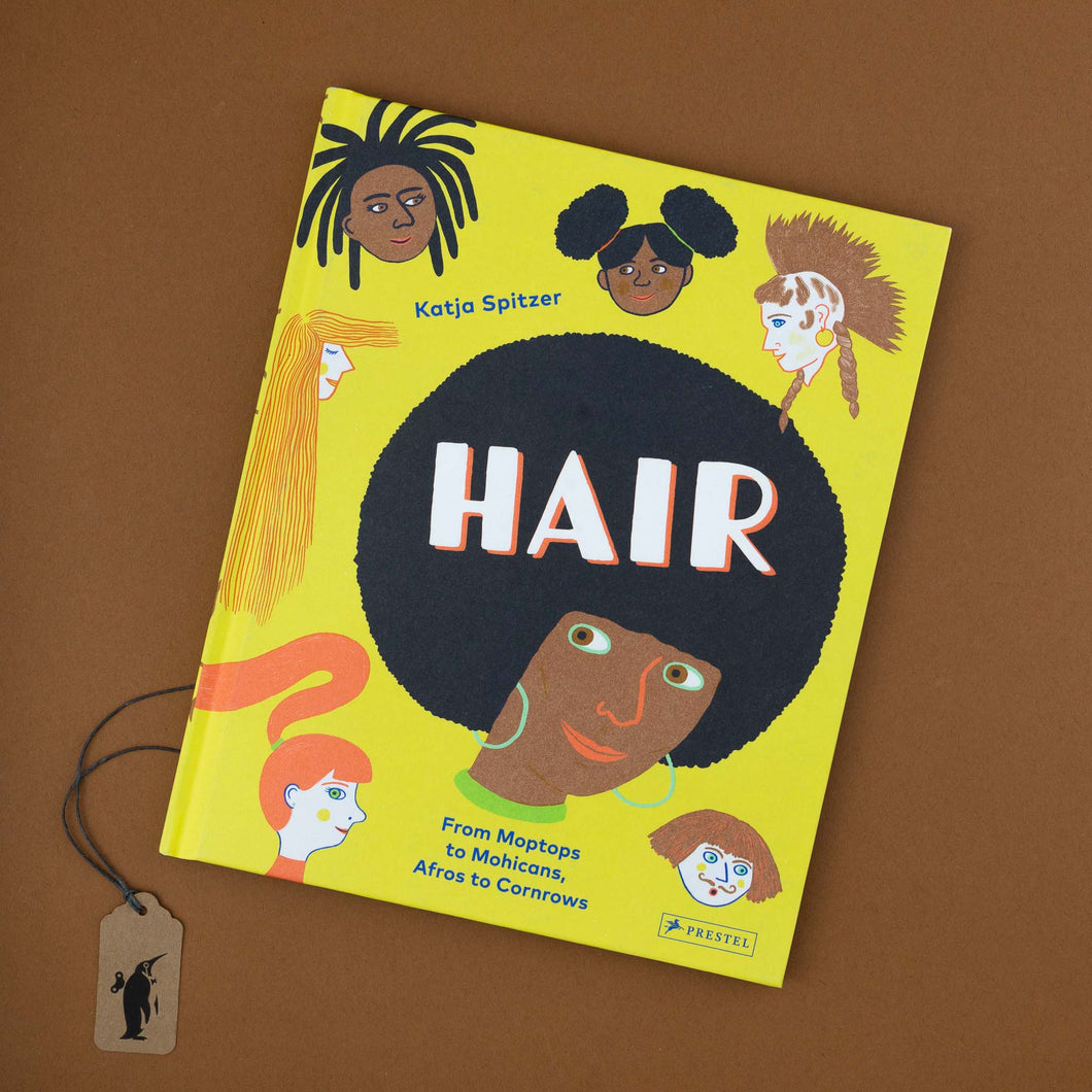 hair-book-featuring-diverse-illustrations-of-hair-styles-on-yellow-cover