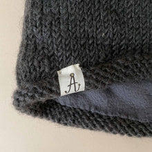 Load image into Gallery viewer, close-up-of-hand-knit-hunter-hat-label