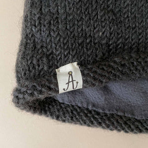 close-up-of-hand-knit-hunter-hat-label