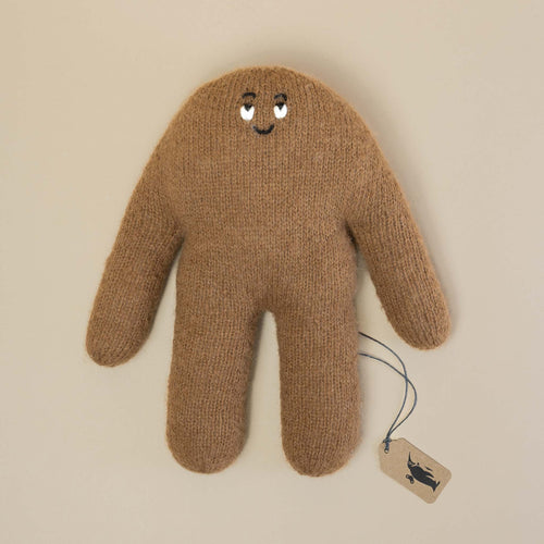brown-round-monster-with-stitched-face
