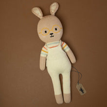 Load image into Gallery viewer, hand-knit-beige-bunny-doll-in-striped-shirt-and-ivory-overalls