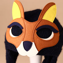 Load image into Gallery viewer, knitted-navy-hat-with-chin-strap-and-brown-kangaroo-removable-felt-mask-with-yellow-ears