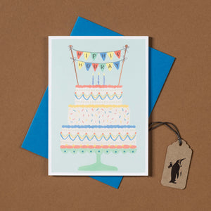 hip-hip-hooray-on-pennants-topping-birthday-cake-greeting-card-with-blue-envelope