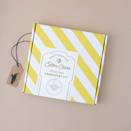 yellow and white candy striped box