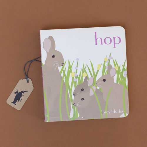 hop-board-book-four-bunnies-in-the-middle-of-flowers