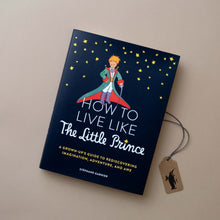 Load image into Gallery viewer, front-cover-navy-blue-illustrated-with-stars-and-the-little-prince