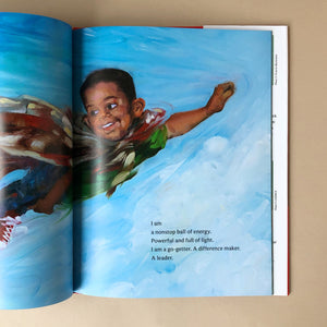 i-am-every-good-thing-book-illustrations-of-litttle-boy-flying-with-cape-in-the-sky-by-derrick-barnes-and-gordon-c-james