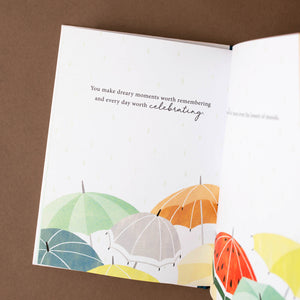 interior-page-illustrated-with-umbrellas-about-celebrating