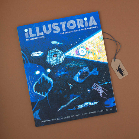 Illustoria Magazine Issue 20 Mystery cover of a child illuminating the deep ocean