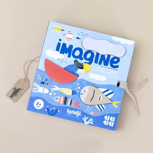 imagine-puzzle-box-set-with-shapes-and-puzzle-scene