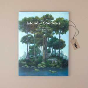 book-cover-showing-a-small-island-with-big-pine-trees