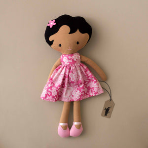 ivy-doll-with-tan-skin-black-hear-bright-pink-flower-bow-and-bright-pink-floral-dress