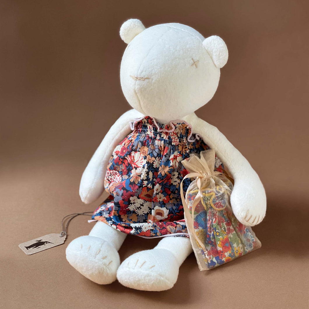 white-bear-with-red-and-blue-floral-dress