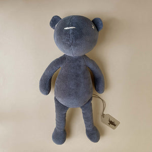 dark-grey-bear-with-stitched-details-laying-down