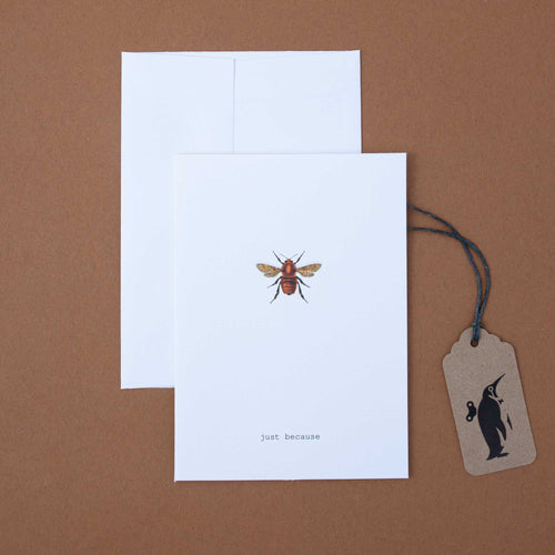 white-card-illustrated-bee-and-black-text-reading-just-because