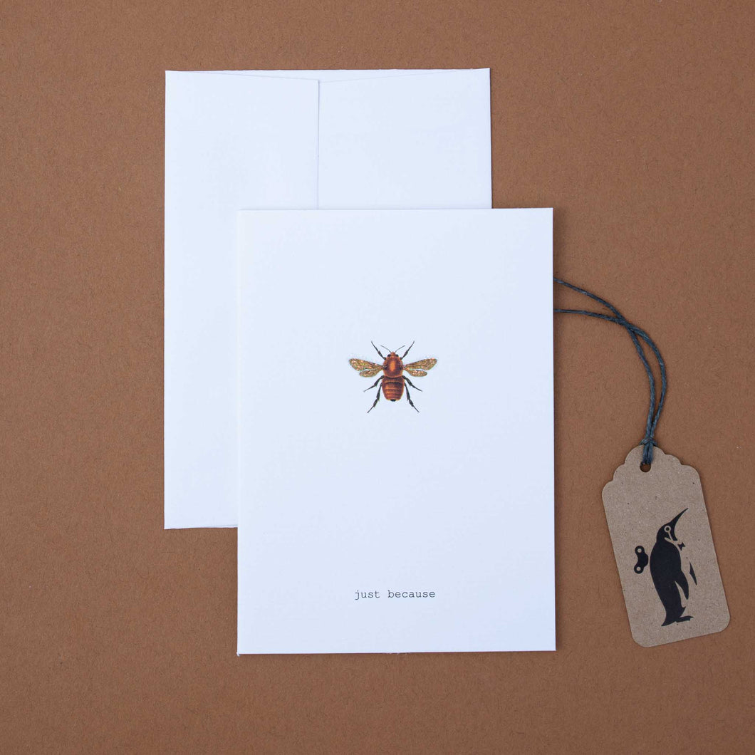 white-card-illustrated-bee-and-black-text-reading-just-because