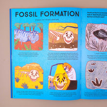 Load image into Gallery viewer, open-book-showing-blue-page-with-information-and-illustrations-about-the-fossil-formation