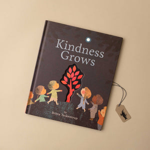 black-book-cover-with-red-tree-in-cutout-and-illustrated-children