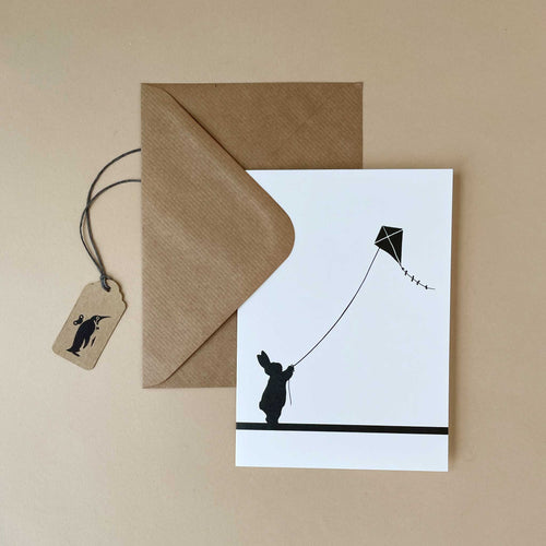silhouetted-rabbit-flying-kite-greeting-card
