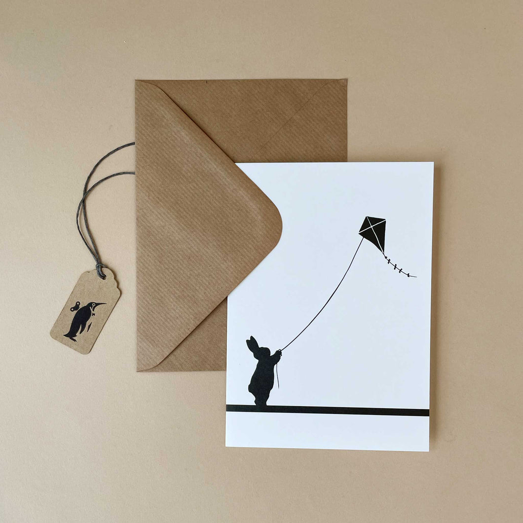 silhouetted-rabbit-flying-kite-greeting-card