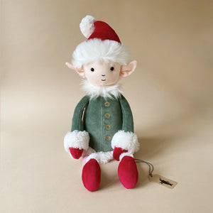 large-leffy-elf-in-green-coat-red-santa-hat-and-striped-leggings