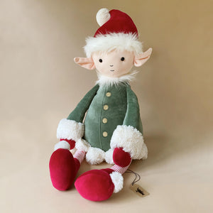 really-big-leffy-elf-in-green-coat-red-santa-hat-and-striped-leggings