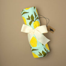 Load image into Gallery viewer, rolled-up-swaddle-with-yellow-lemons-and-green-leafs-on-light-blue-background
