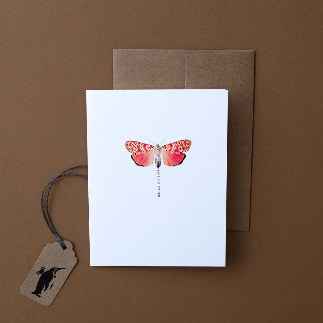 illustrated-moth-on-white-background-with-the-words-like-no-other-in-black-text