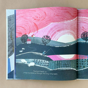 Open page of Listen to the Earth by Carme Lemniscates showing an angler sitting t a lake at sunset