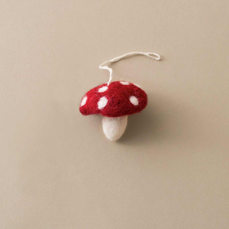 little-felted-mushroom-ornament-with-red-cap