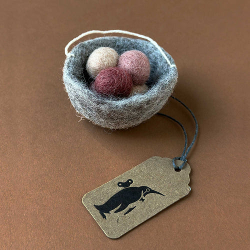 grey felted nest ornament with three little eggs