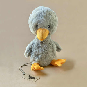 grey-duckling-stuffed-animal-with-yellow-feet-and-beak
