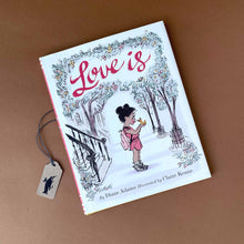 Load image into Gallery viewer, love-is-hardcover-book-illustrated-with-little-girl-holding-yellow-duck