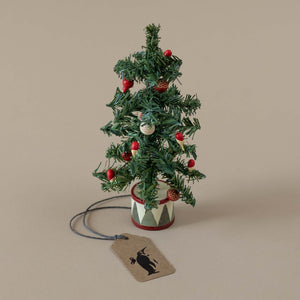 green-tree-with-drum-base-red-and-white-bauble-ornaments