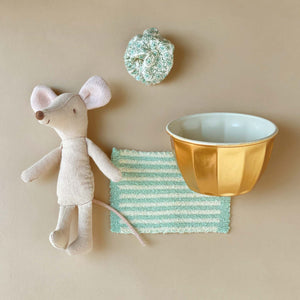 matchbox-mouse-big-sister-flat-lay-gold-tub-shower-cap-mouse-and-towel