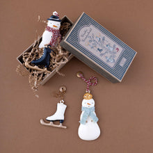 Load image into Gallery viewer, snowmen-and-ice-skate-ornaments-in-box