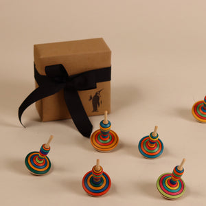 many-spinning-tops-scattered